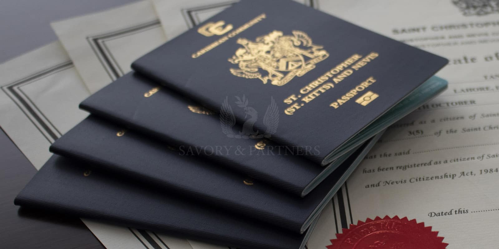 Passports from St Kitts & Nevis for a family of 4 members.