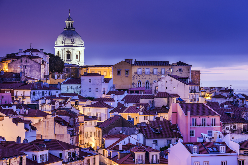 Lisbon, Portugal skyline at Alfama, the oldest district of the city. - Portugal Golden Visa - Savory and Partners